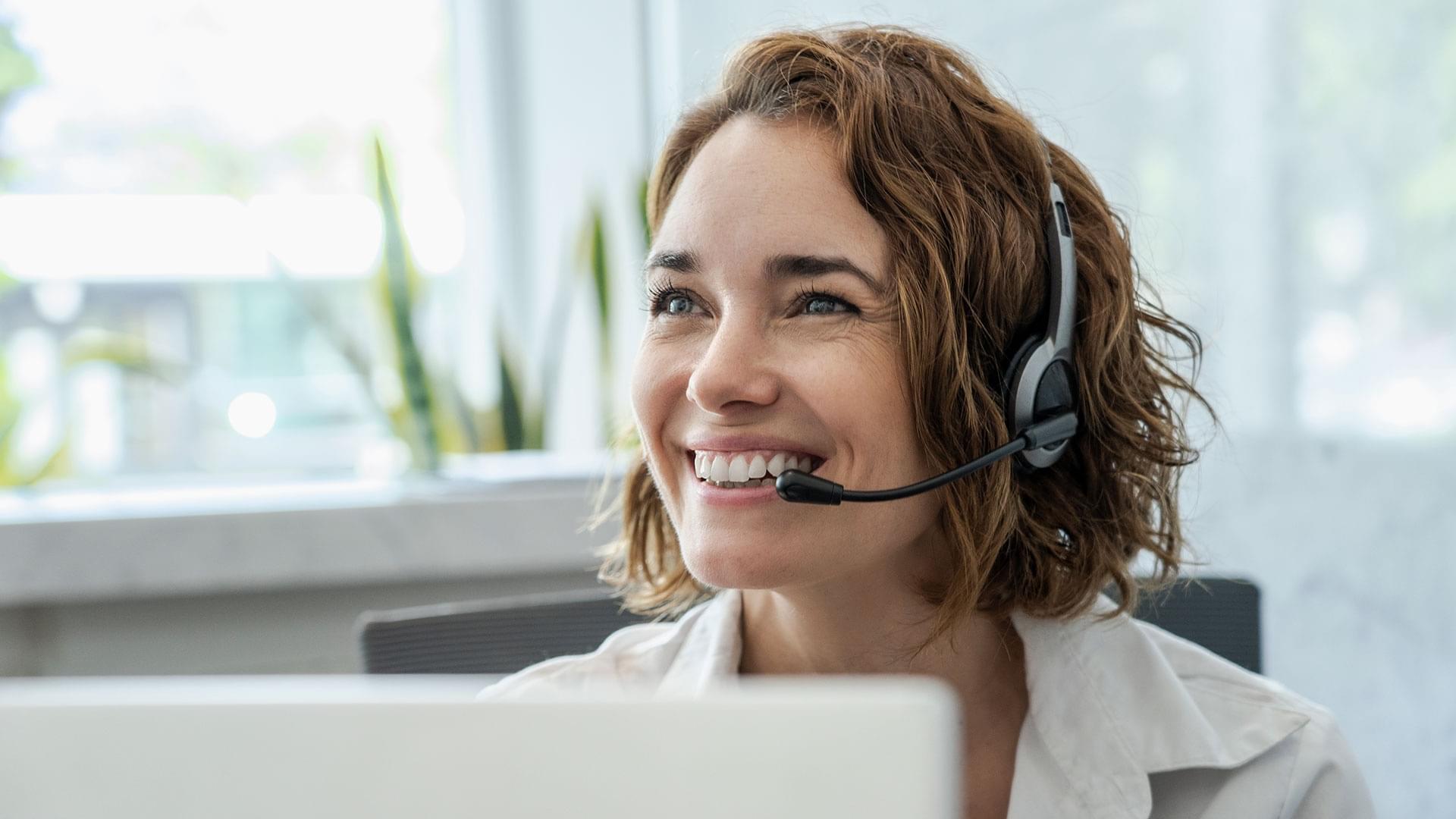 Call center employee during a business call