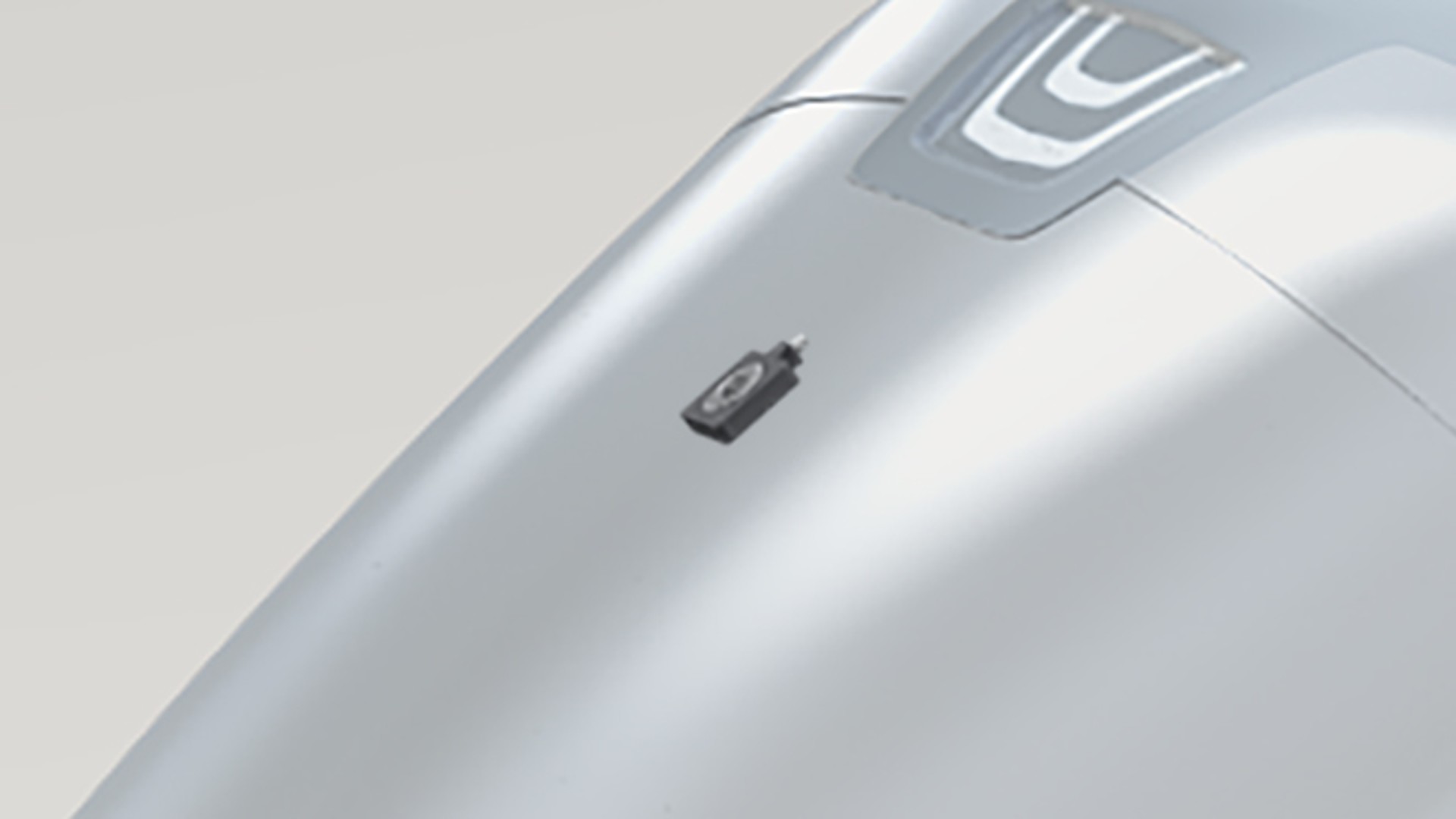 Close-up of metallic automotive component assembly.