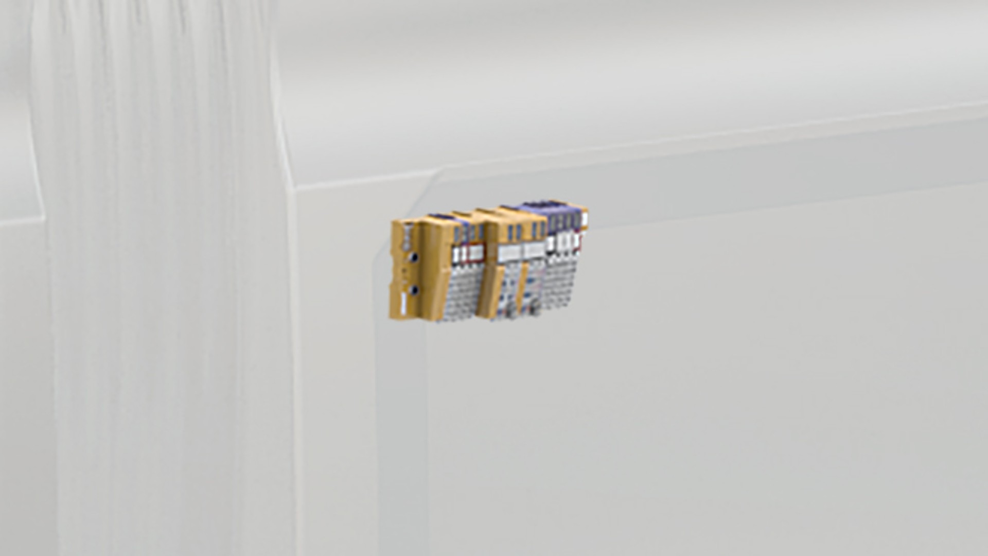 Electrical connectors mounted on a white surface.