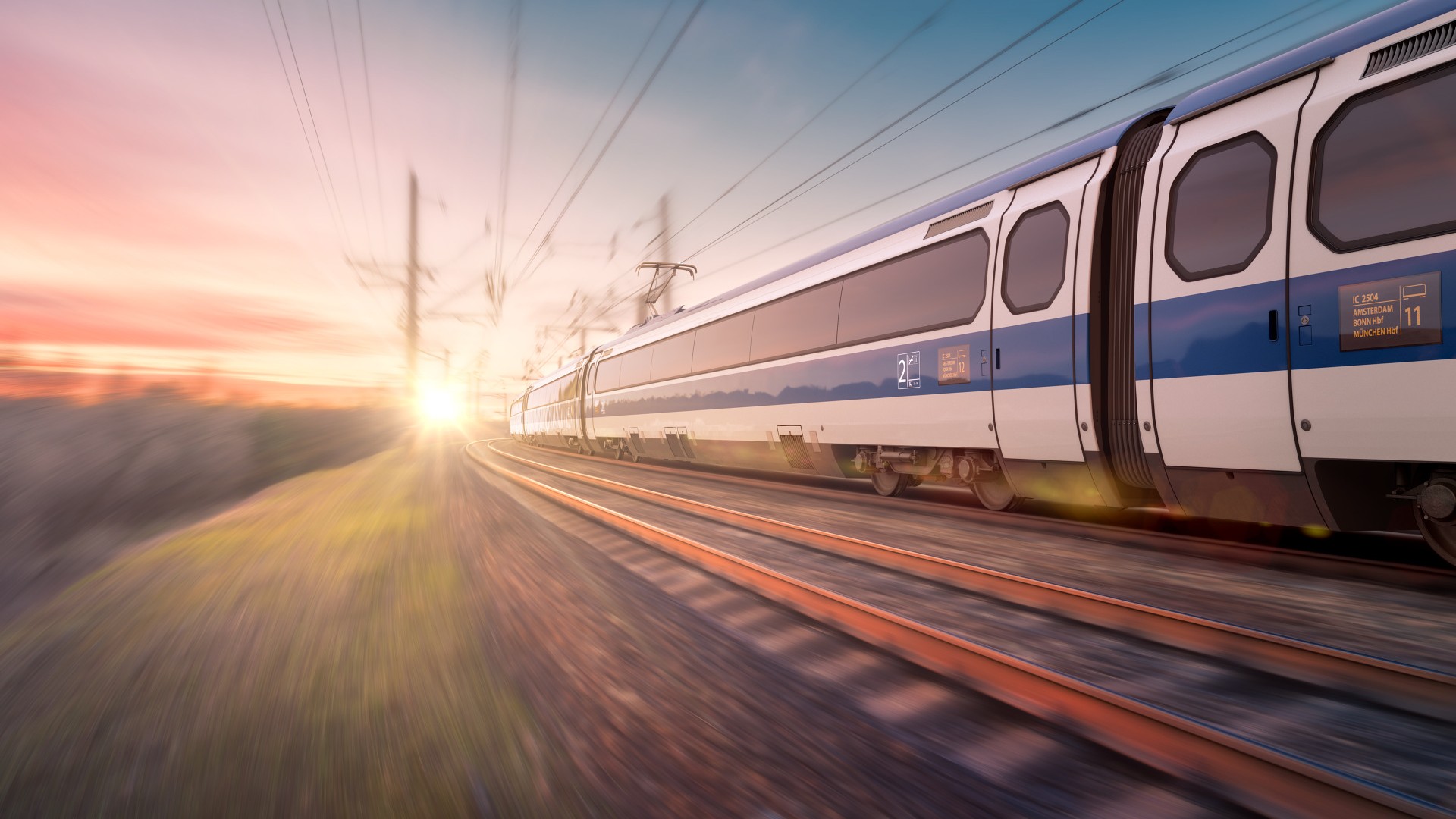 High-speed train traveling on railway tracks at