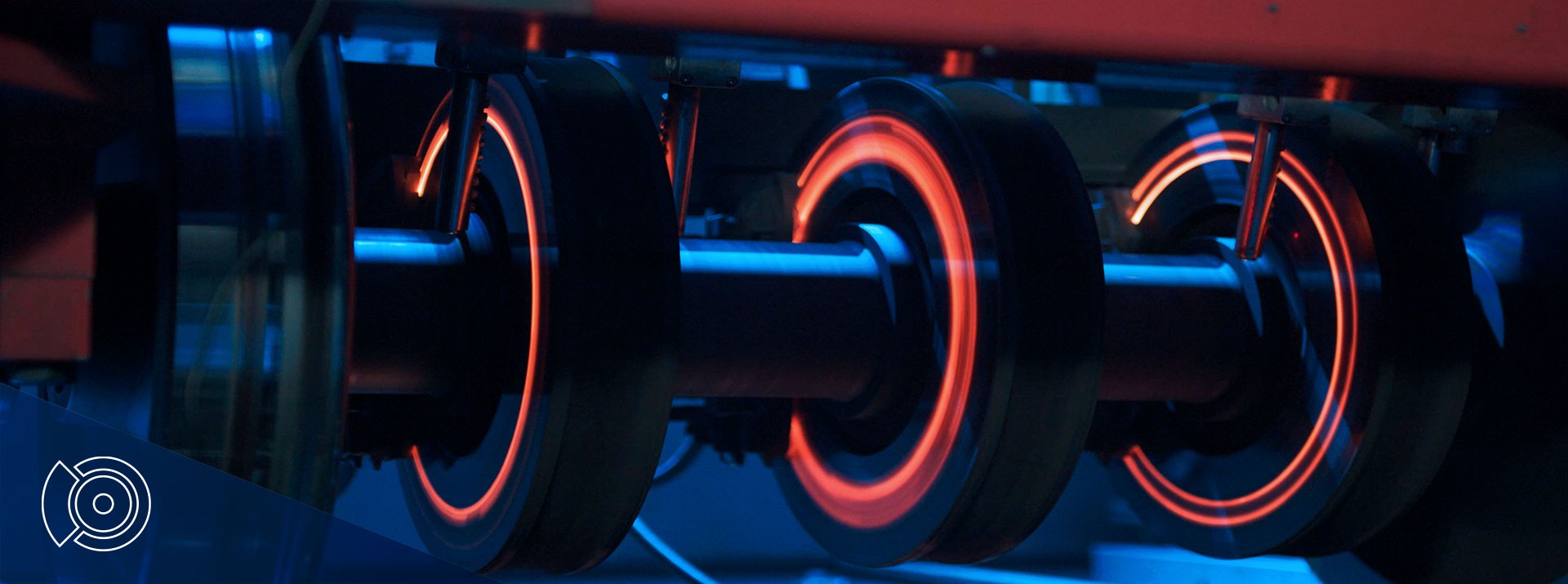 Electric train wheel assembly with glowing components.
