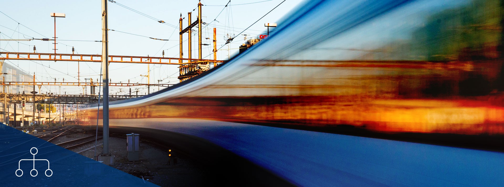 High-speed train passing through railway tracks.