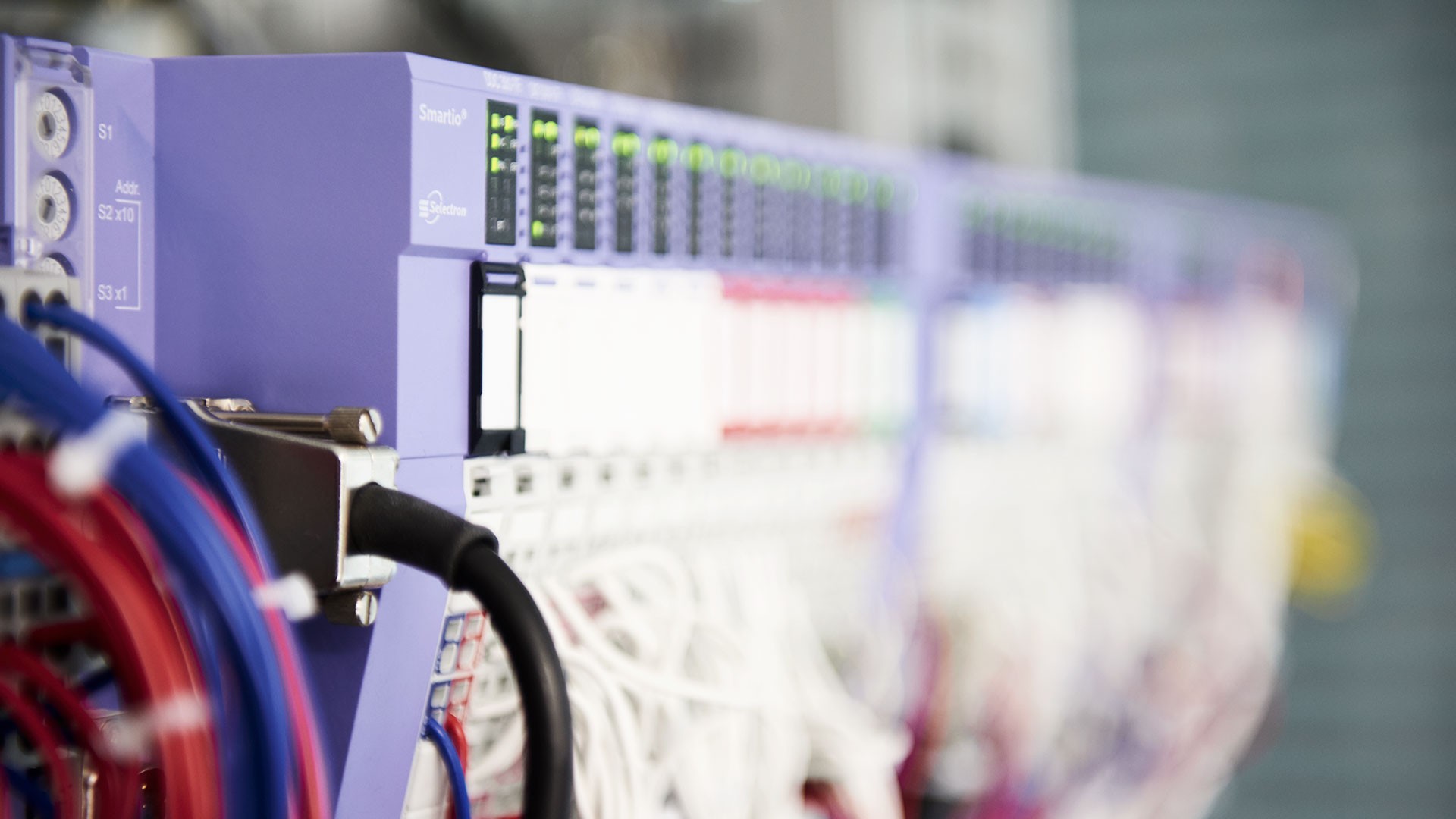 Technical control unit with colorful wiring connections.