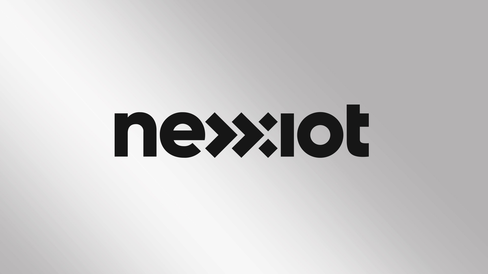 Nexxiot logo on a metallic background