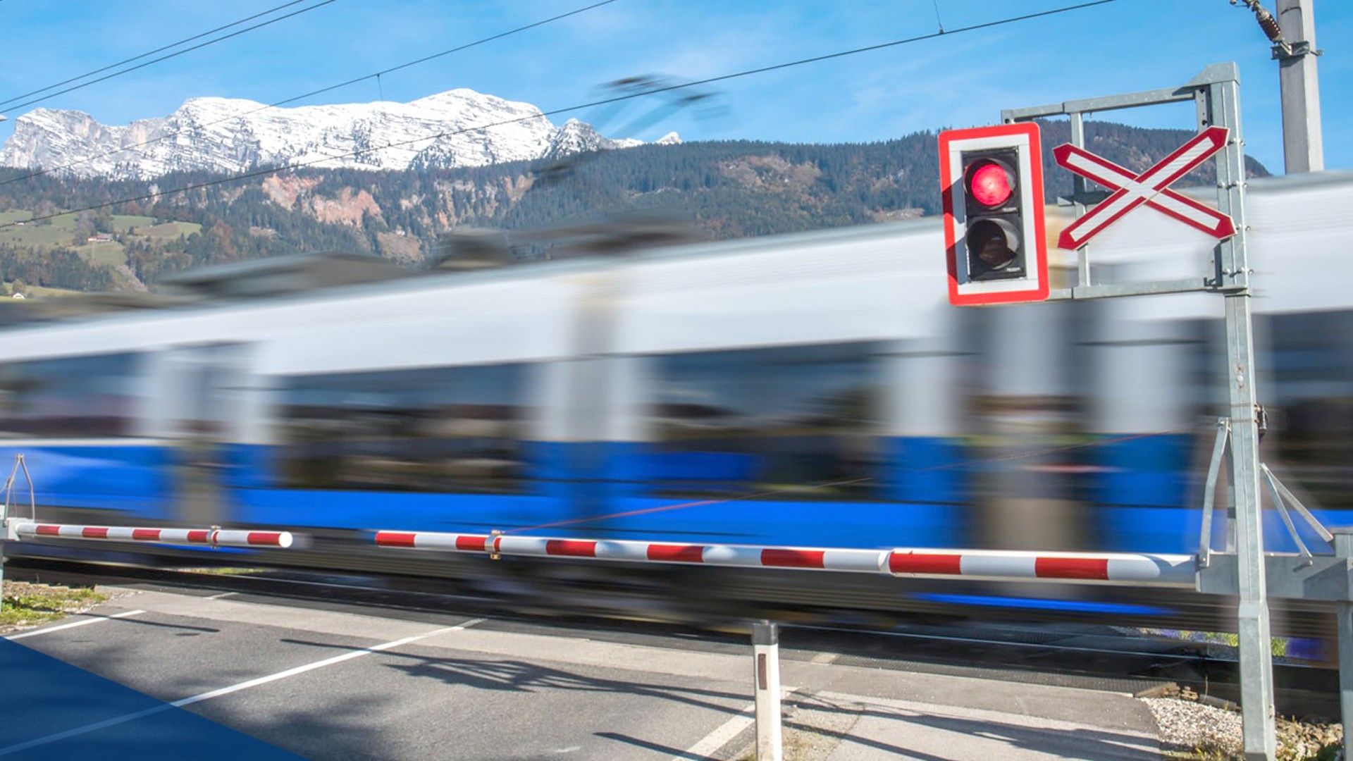 Train passing a red signal and crossing