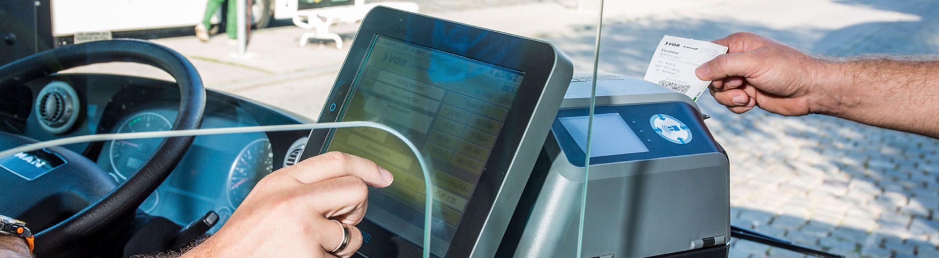 Bus ticket payment system with touchscreen interface.