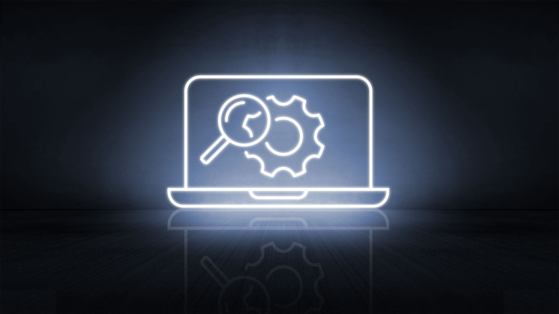 Laptop graphic with gear and magnifying glass.