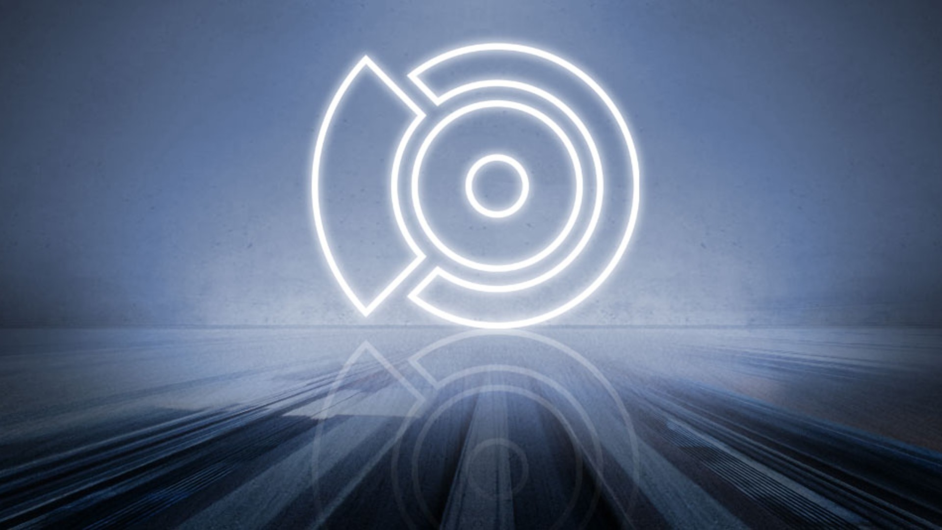 Illuminated logo on dark background with reflections.