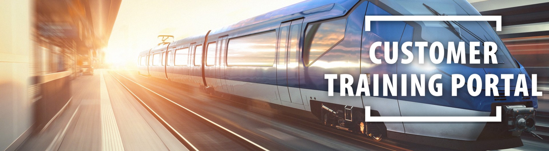 Train in motion at a railway station.