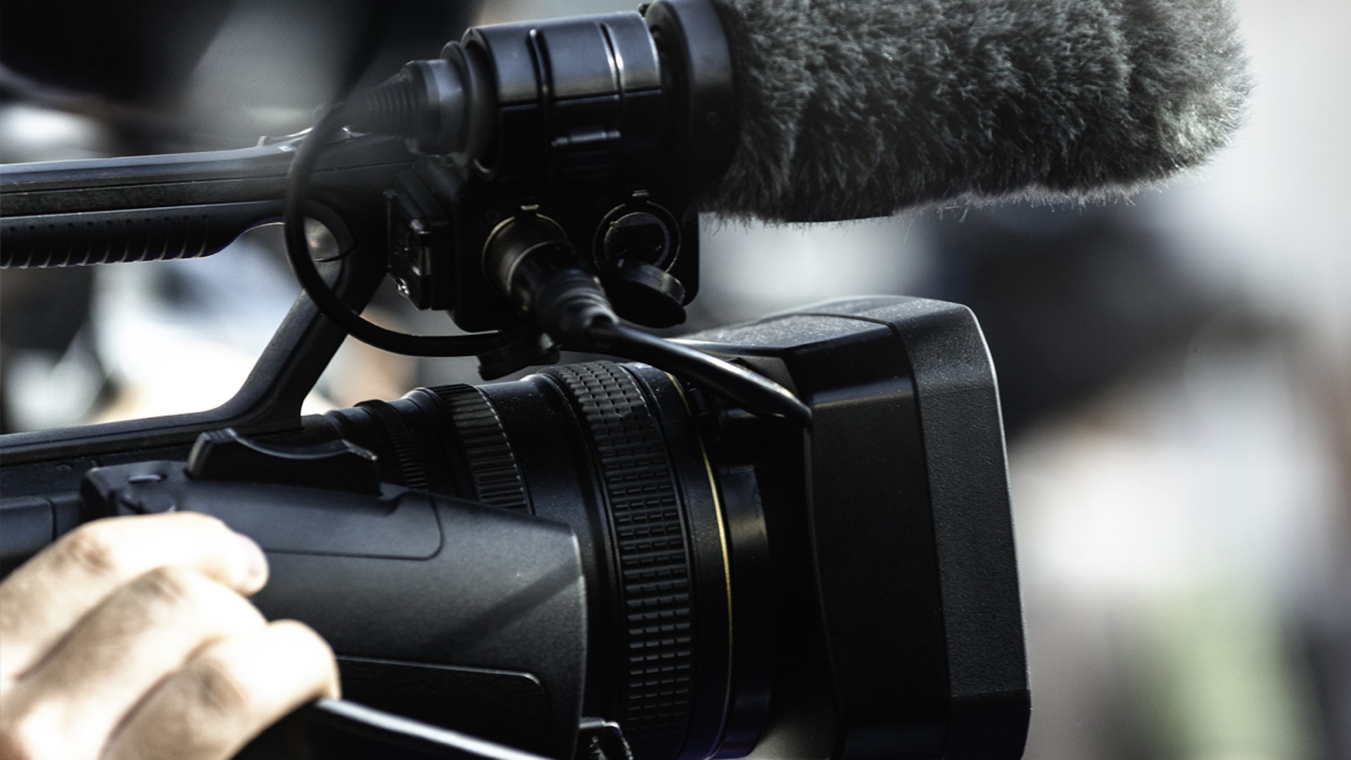 Camera and microphone capturing a live event.