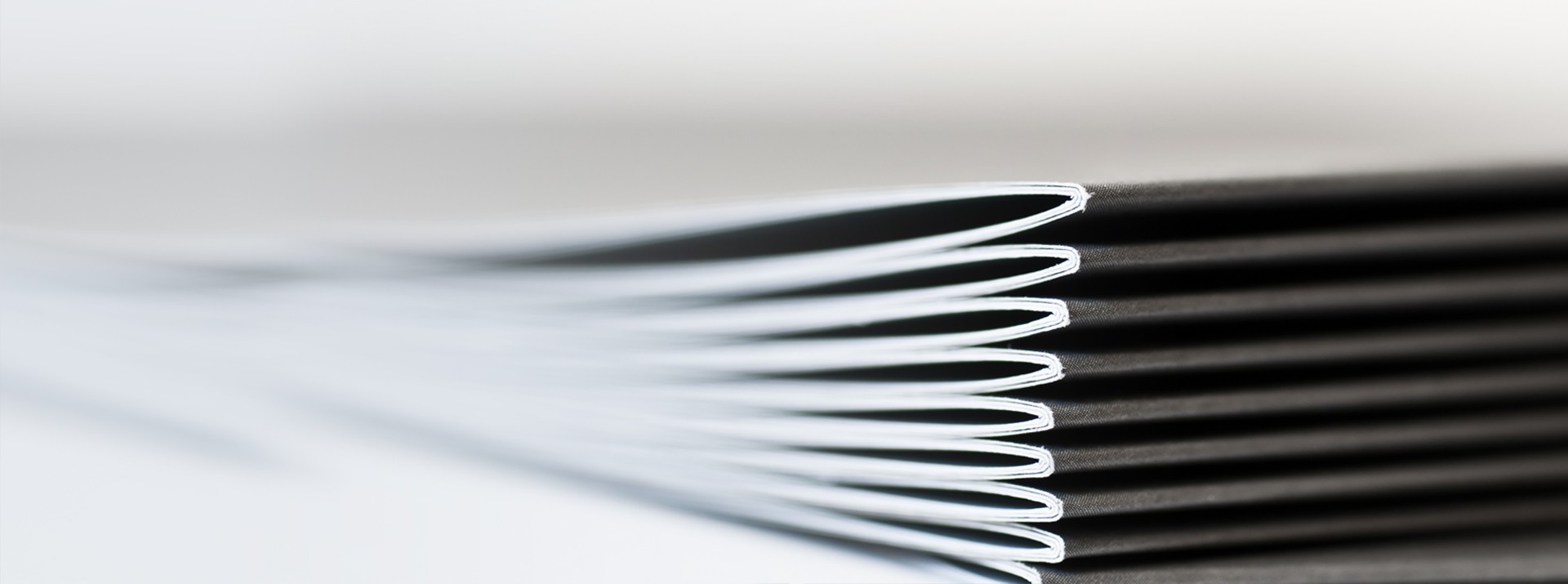 Stacked sheets of paper with smooth edges