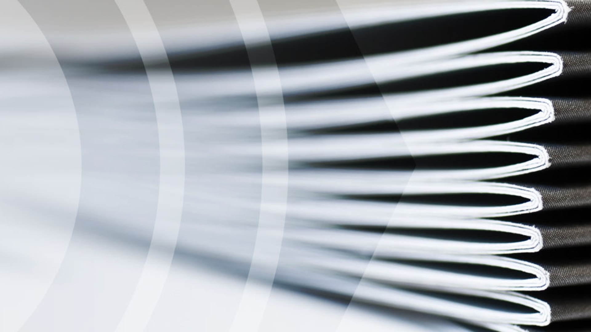 Close-up of layered paper sheets.