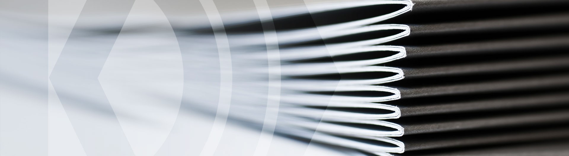 Close-up of layered paper sheets.