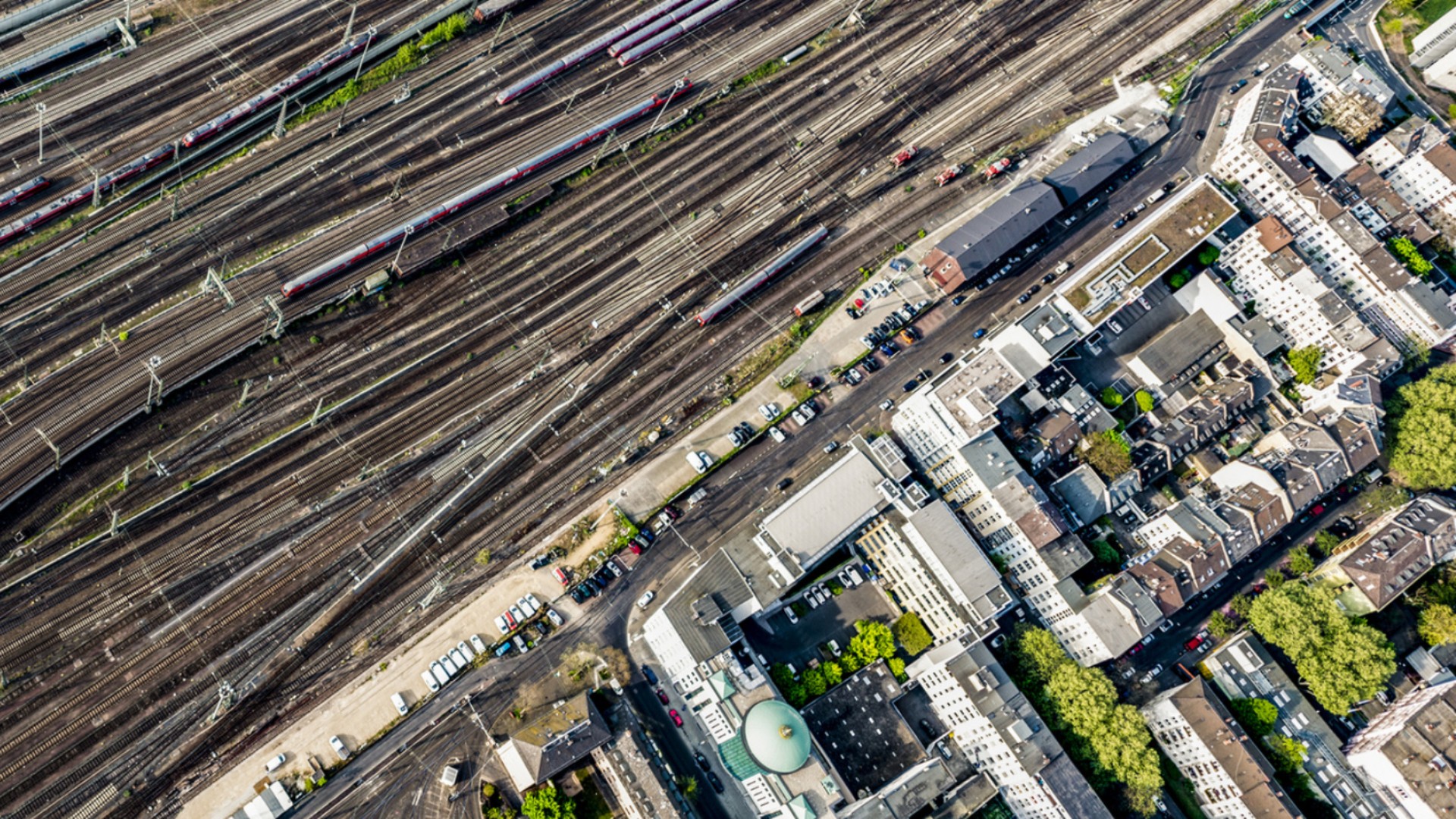 Aerial view of railway tracks and city