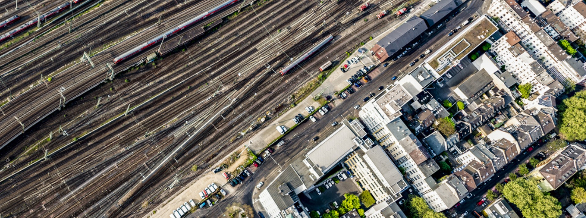 Aerial view of railway tracks and city