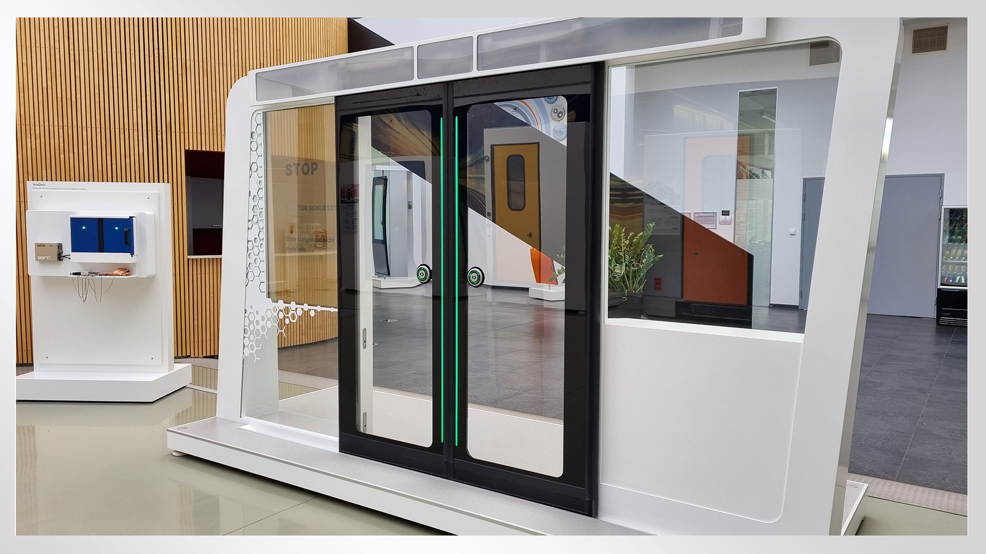 Modern glass doors in a transit display