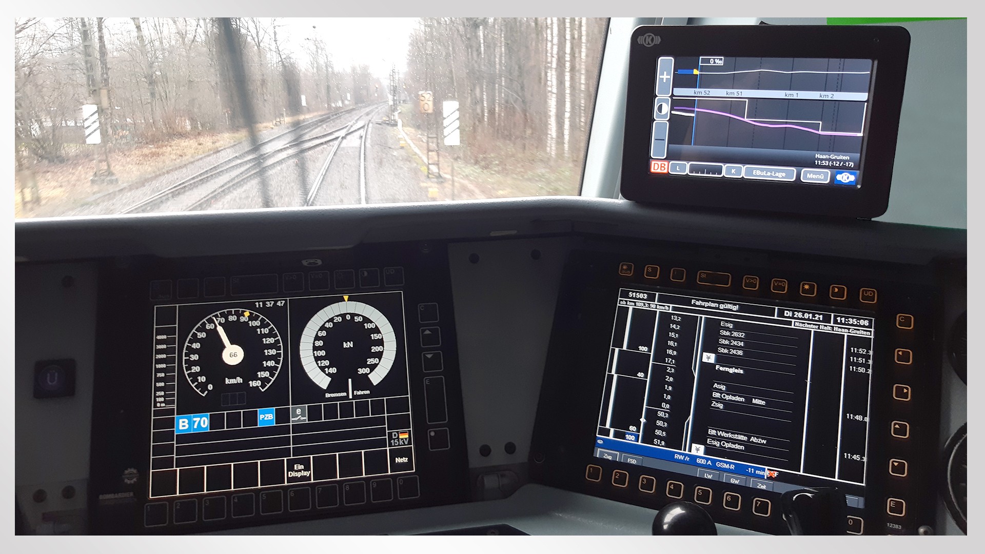 Train control panel displaying speed and data.