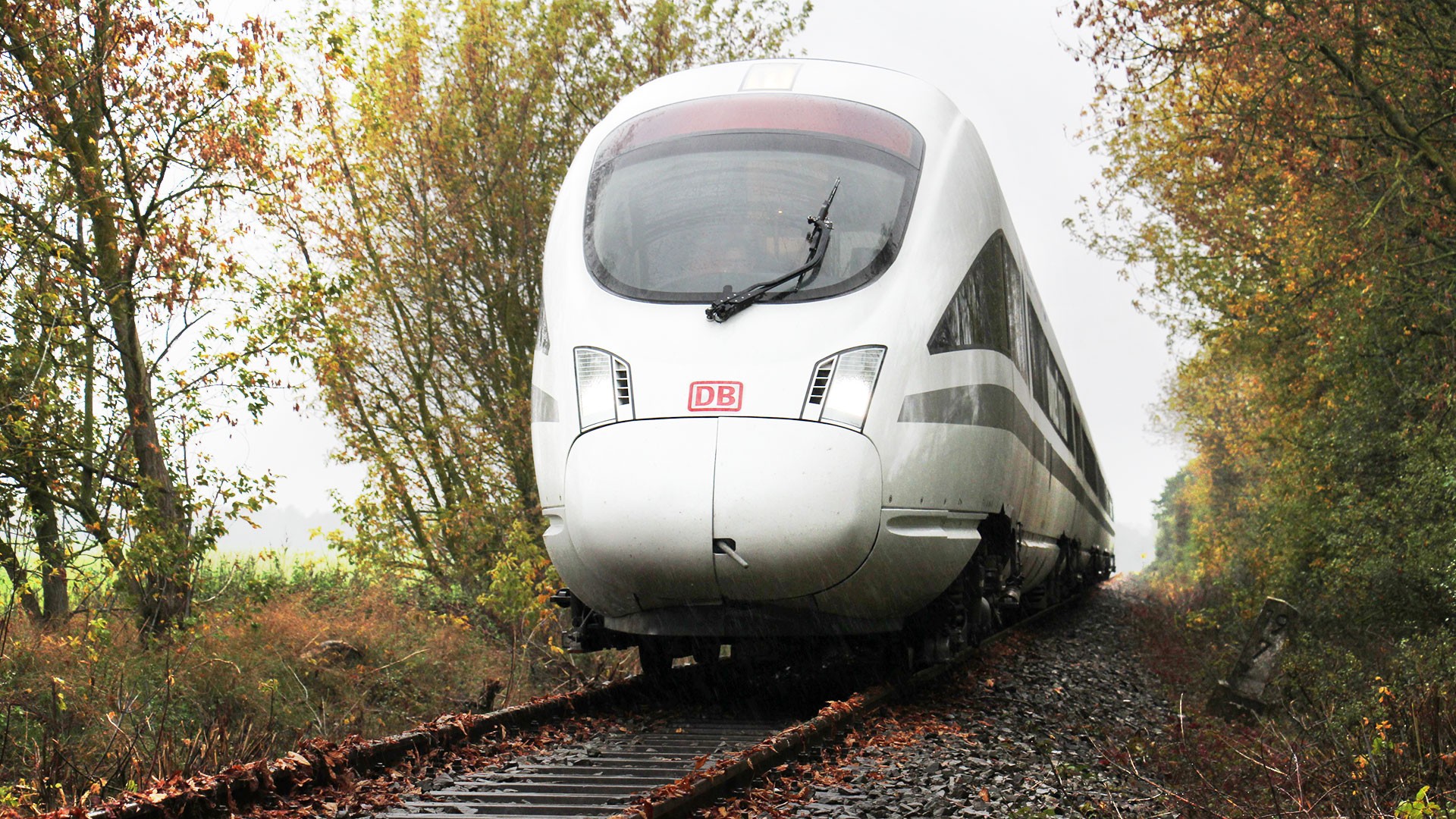High-speed train traveling on a scenic railway