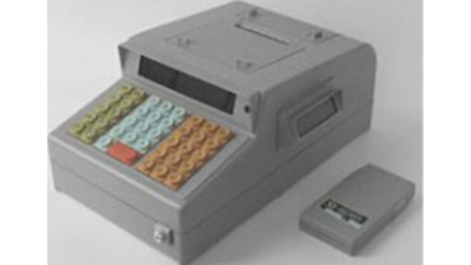 Vintage electronic cash register with colored buttons.