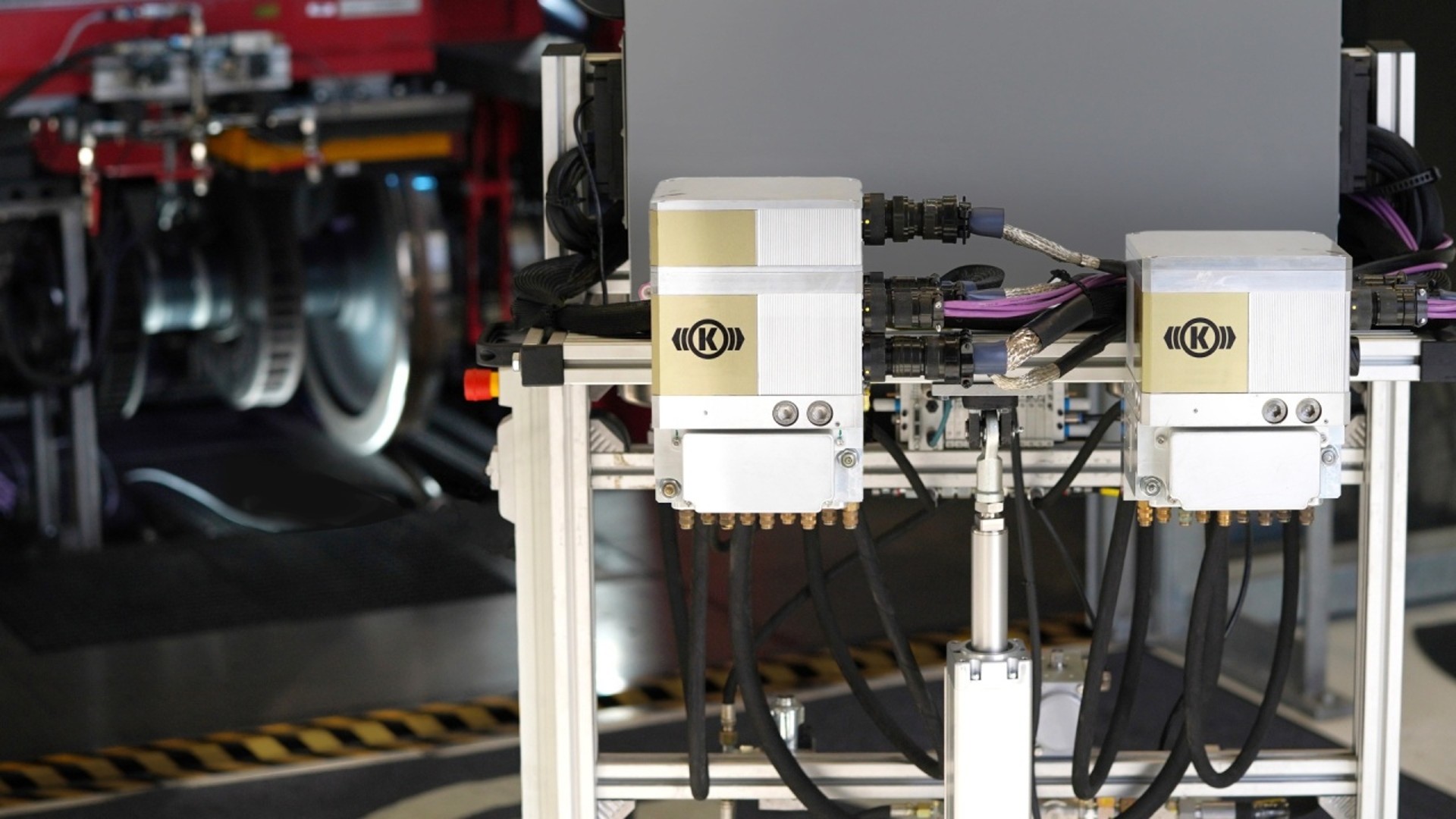 Industrial automation equipment with hydraulic connections.