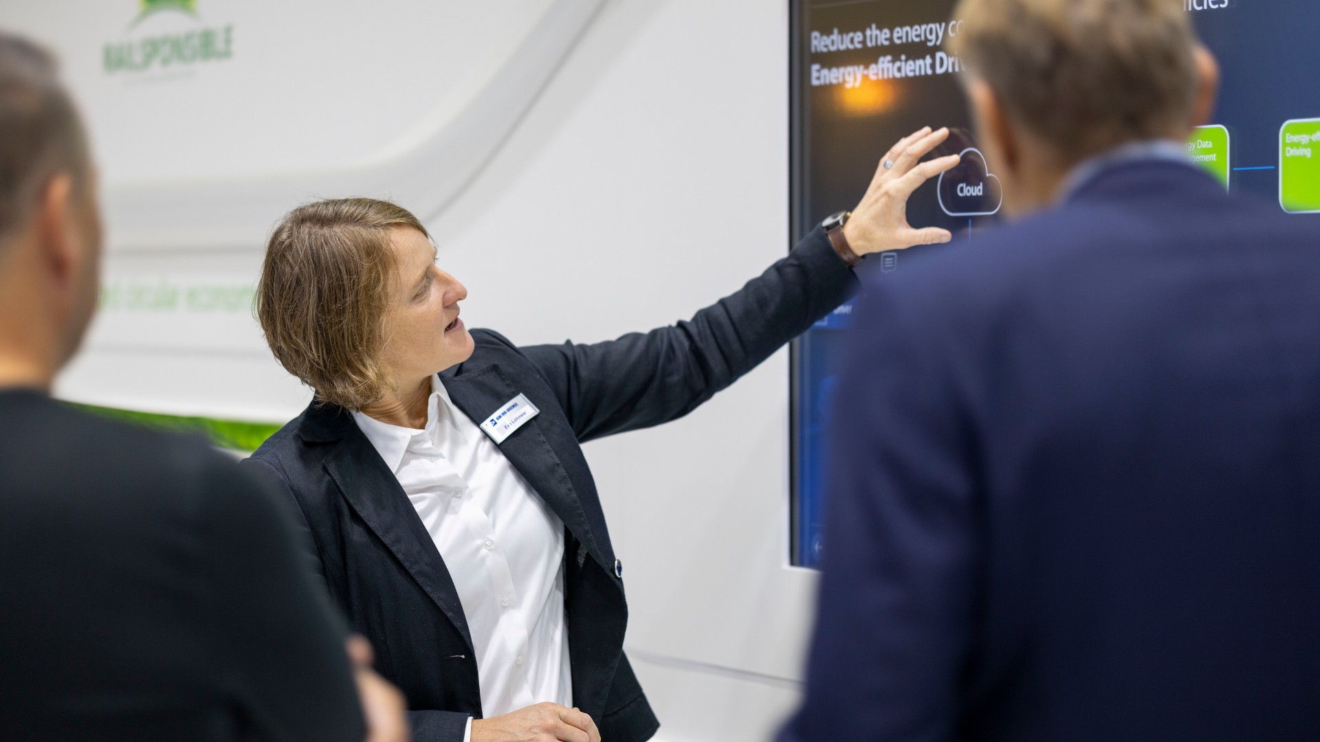 Employee presenting energy-efficient driving technology solutions.