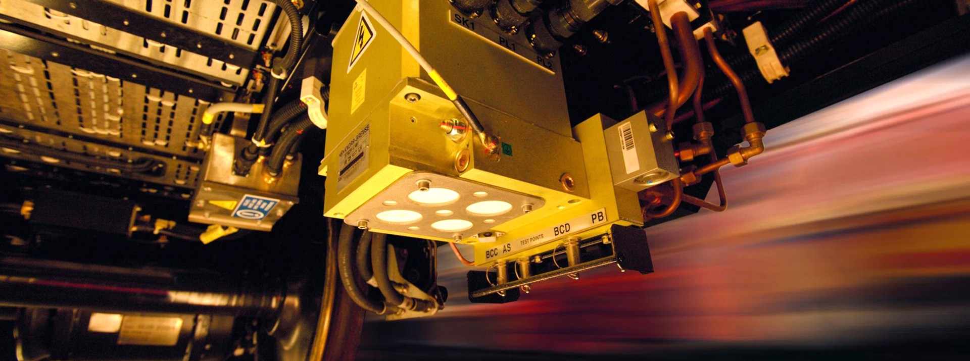 Industrial control equipment under a moving vehicle.