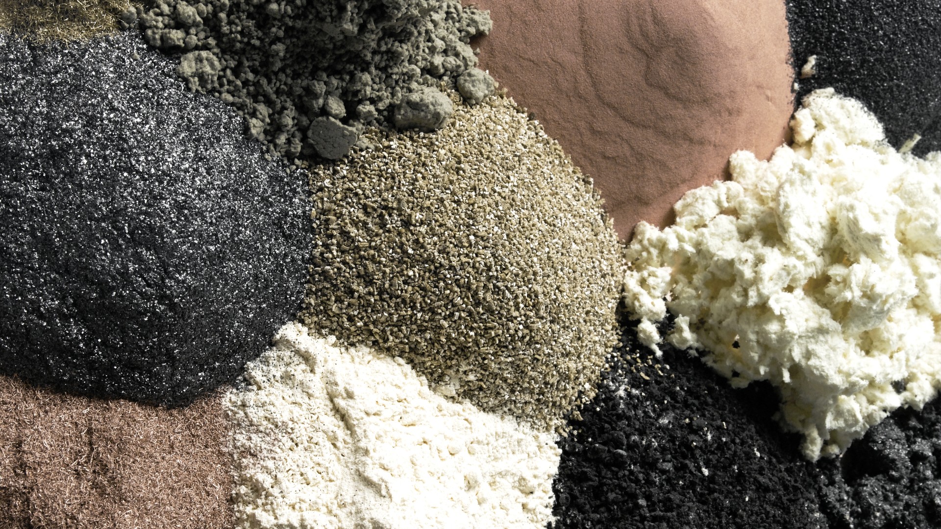 Various textured powders in circular arrangements.