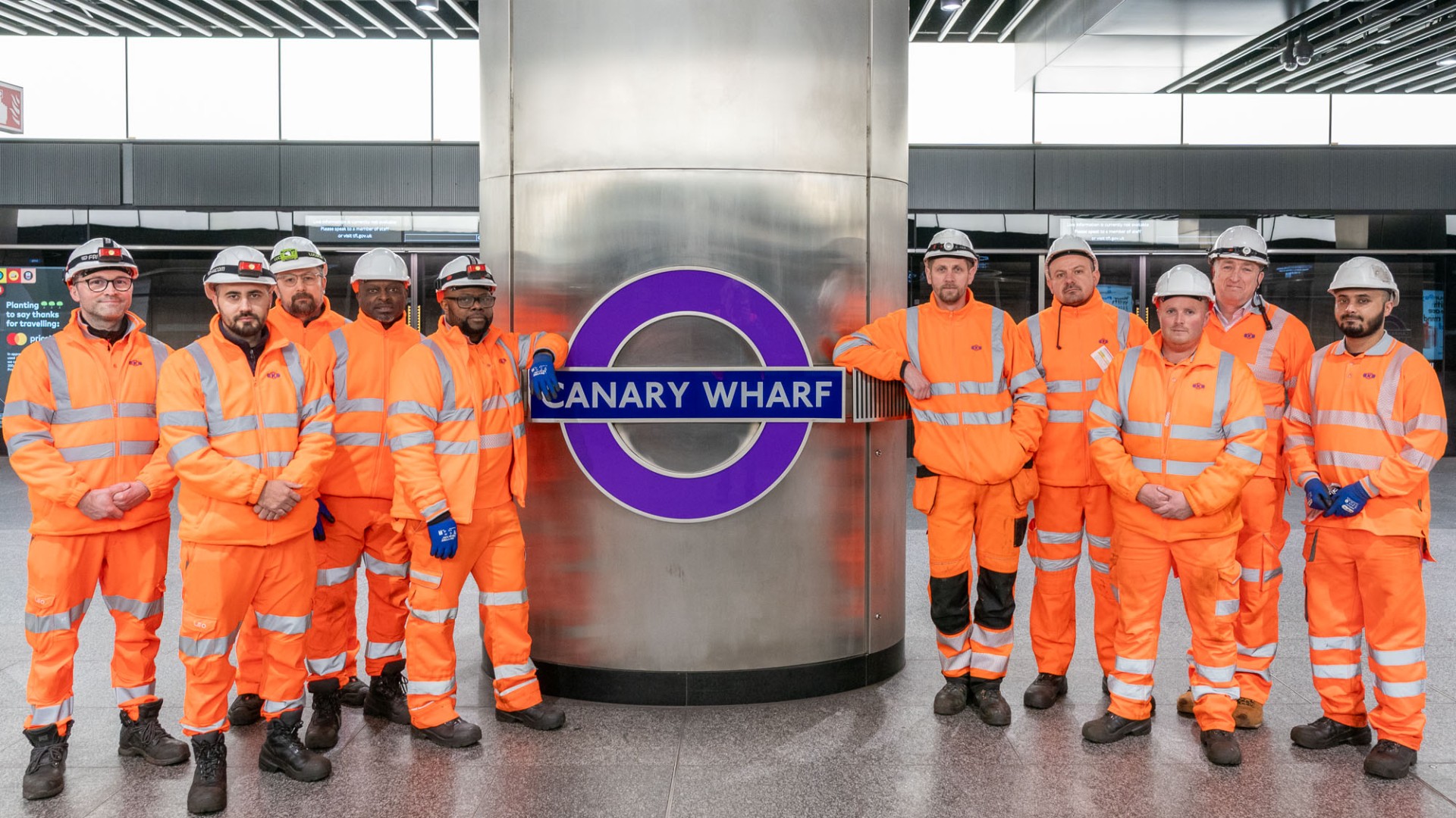 Group picture of Engineers at Canary Wharf station