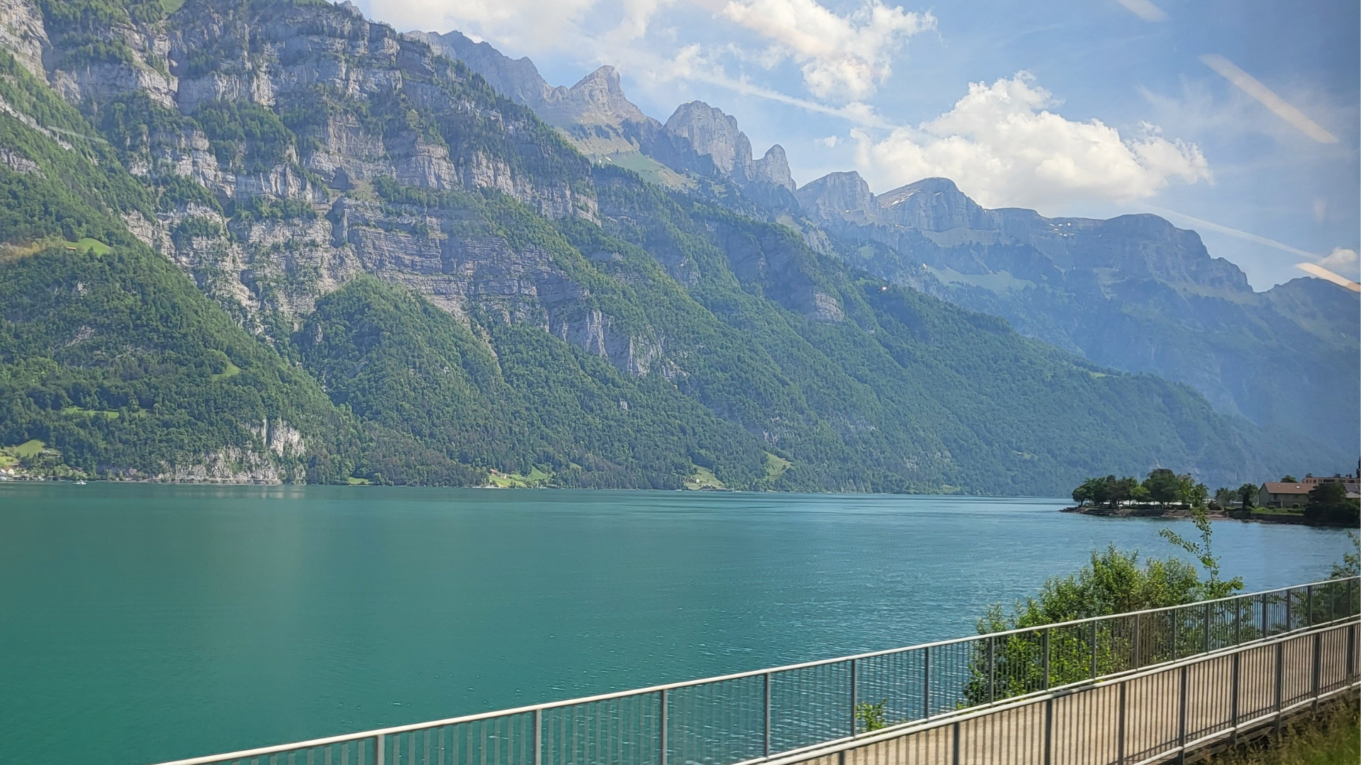 Scenic view of mountains beside a turquoise