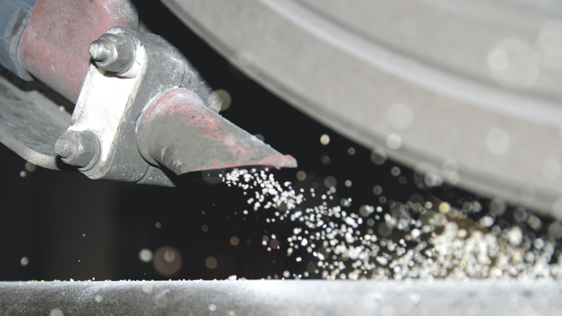 Grinding process with metal shavings and dust.