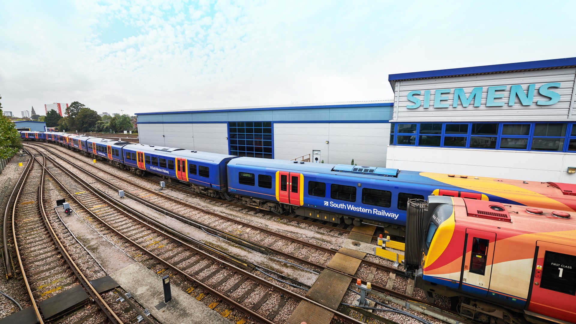 Siemens building with South Western Railway trains.