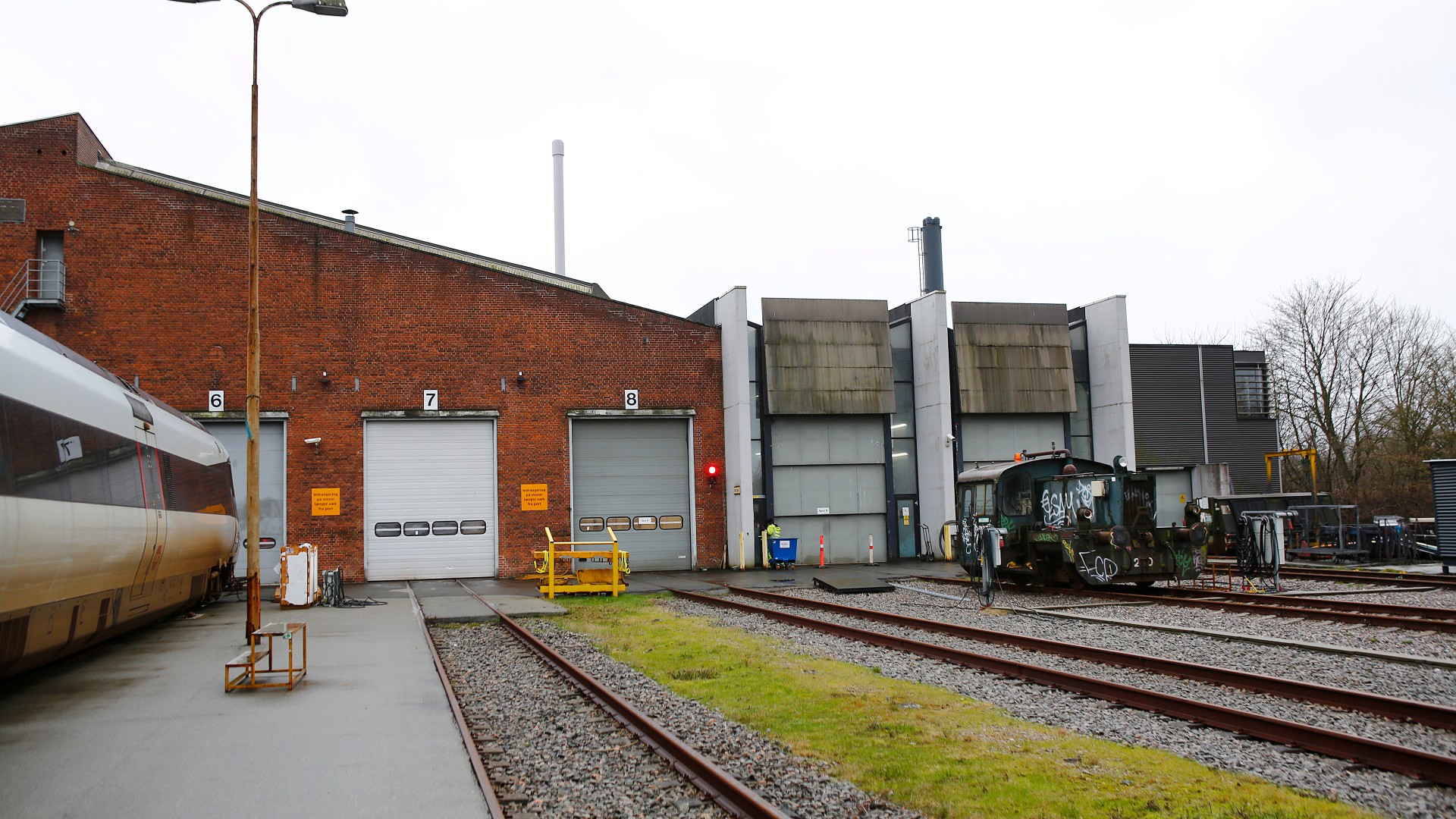 Train station with maintenance buildings and railway