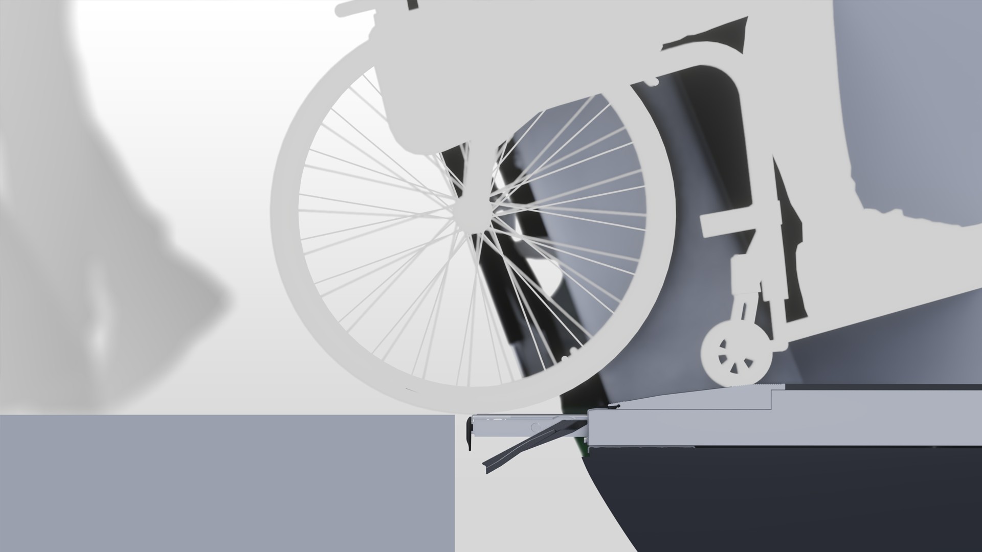 Wheelchair on ramp with bicycle wheel above