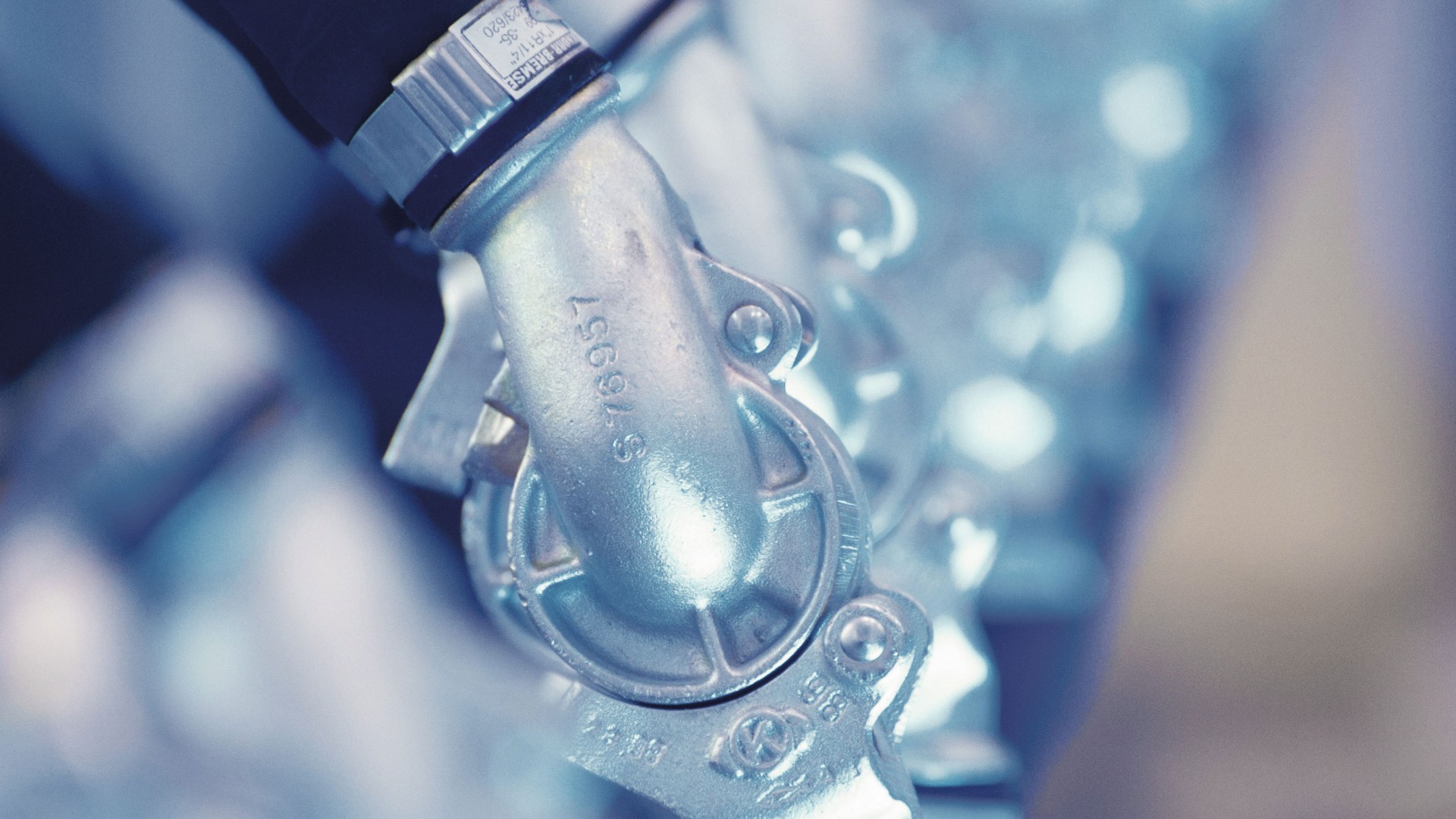 Close-up of metallic valve component in machinery.
