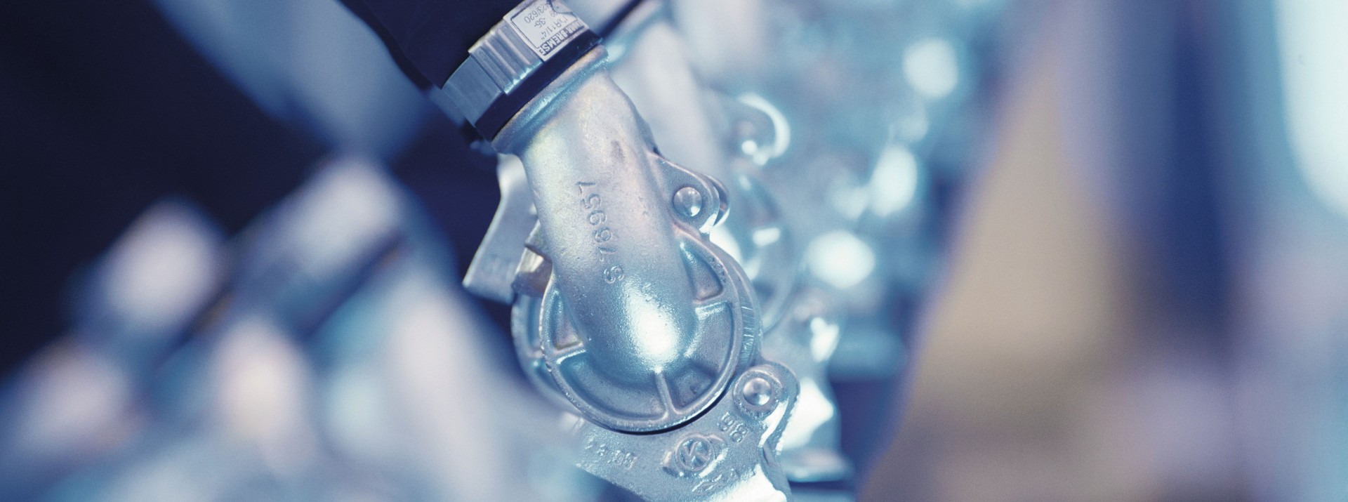 Close-up of metallic valve component in machinery.