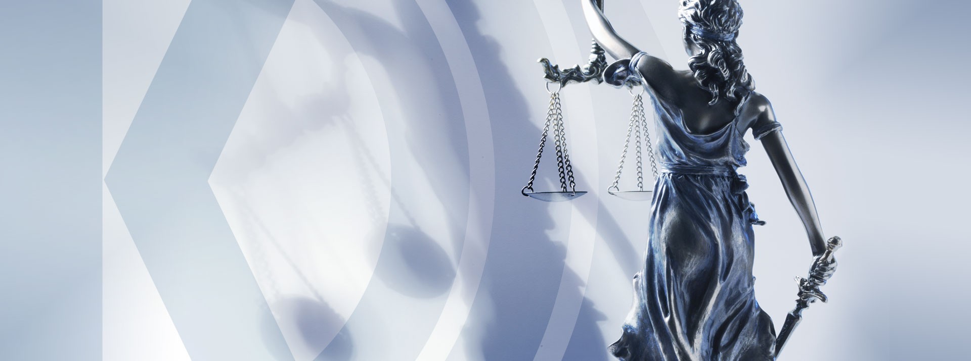 Statue of Lady Justice holding scales and