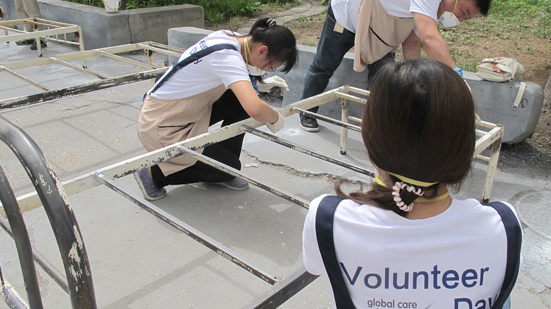 Employees participating in community service project activities.