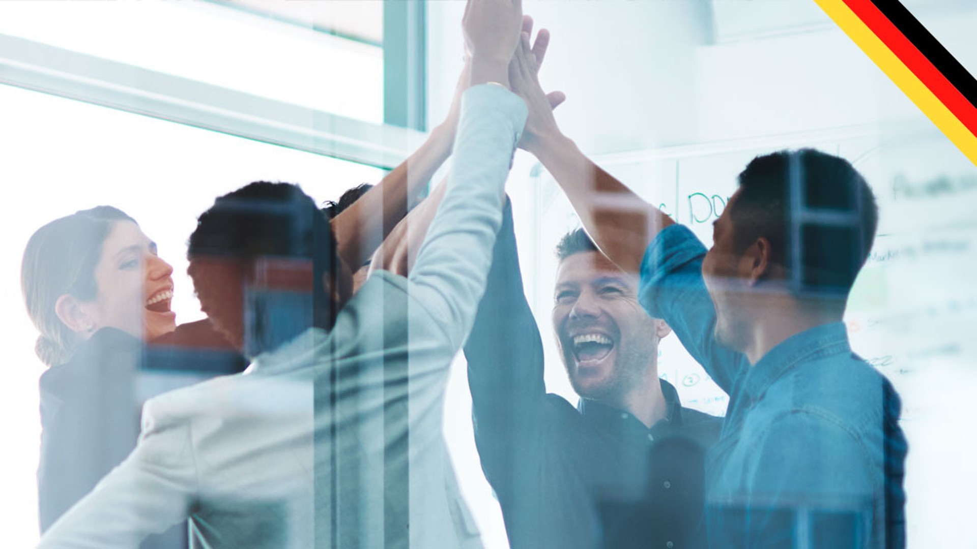 Team celebrating success with high-fives and smiles.