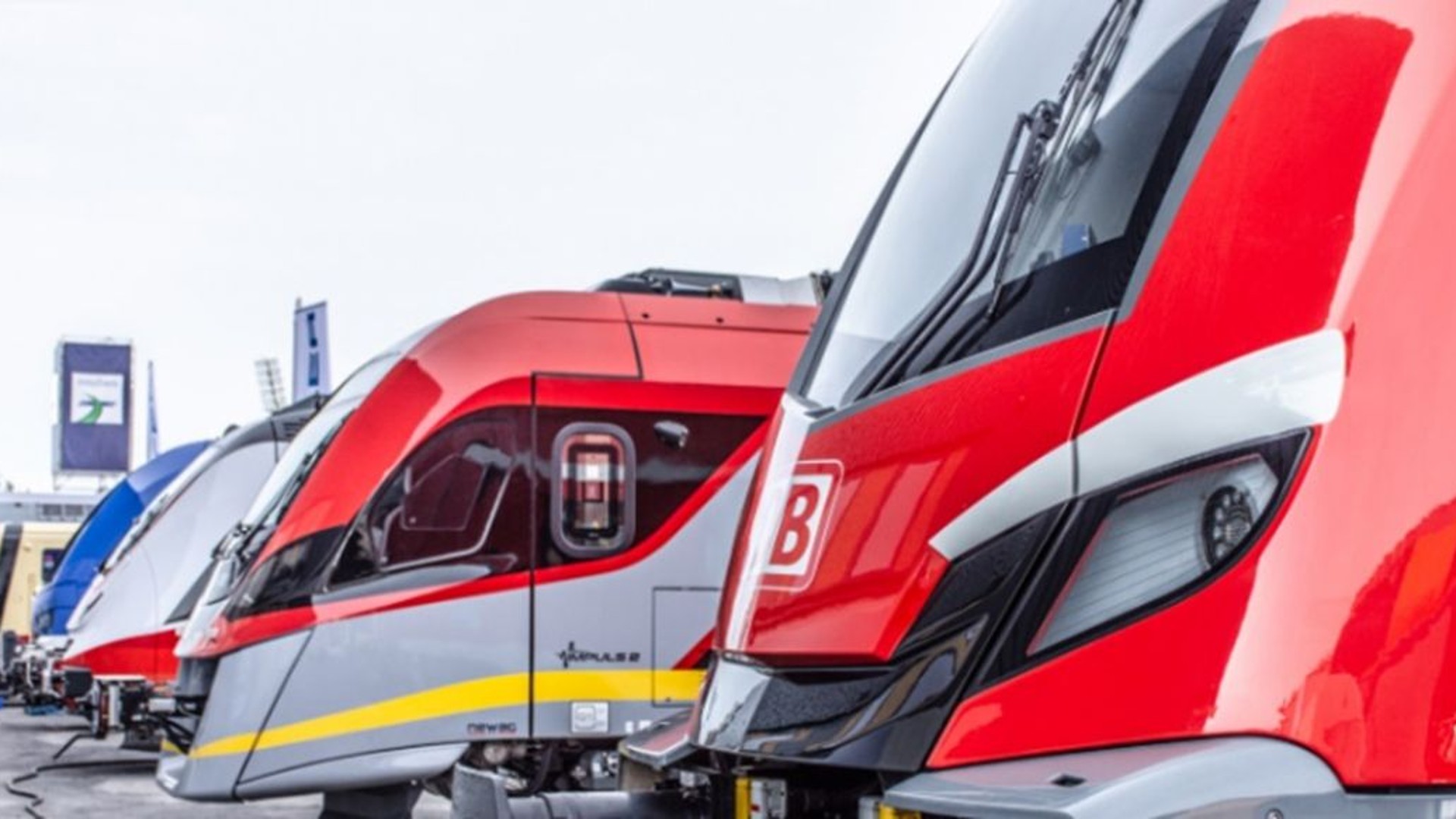 Red and blue modern trains lined up