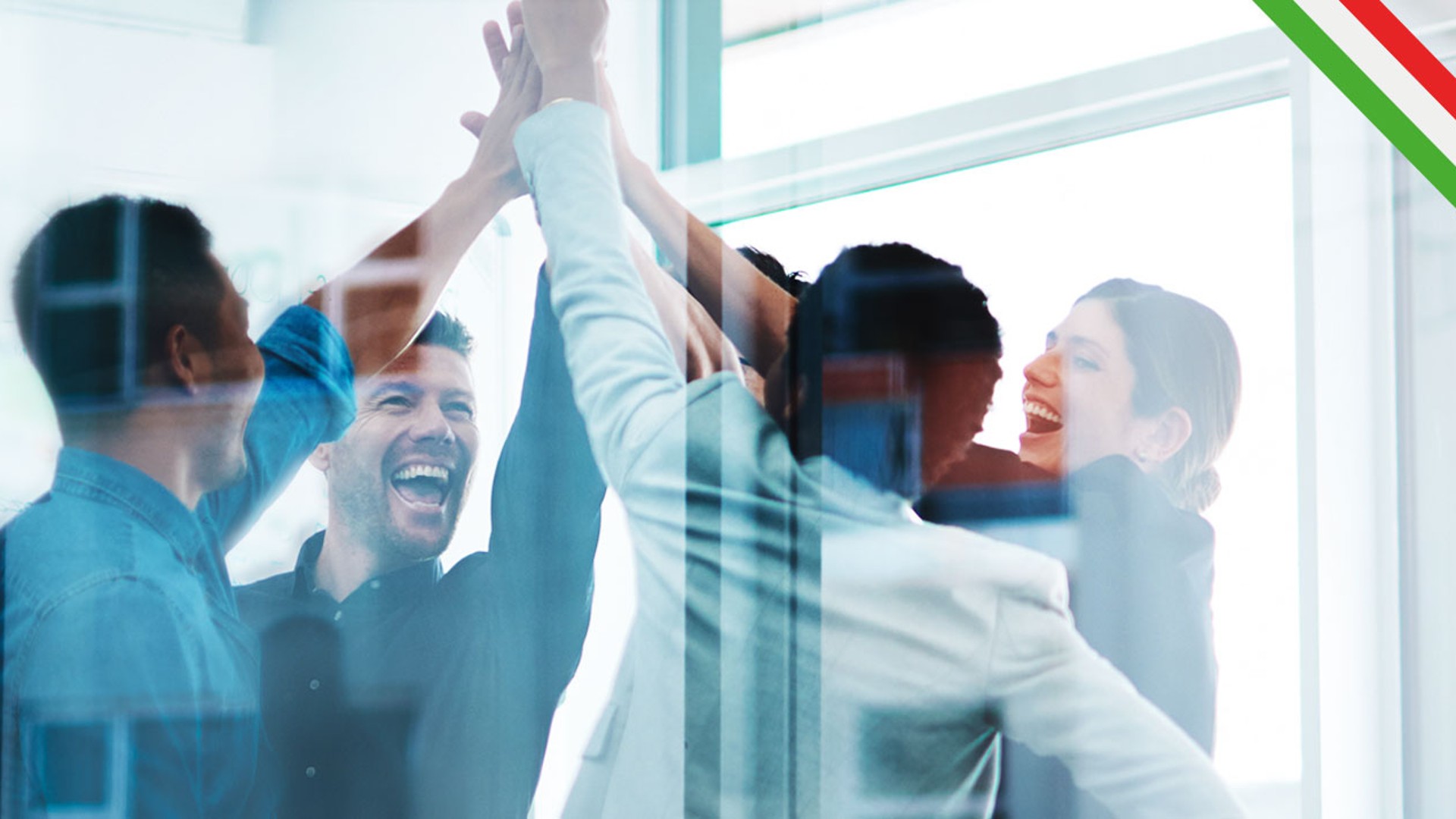 Team celebrating success with high-fives and smiles.