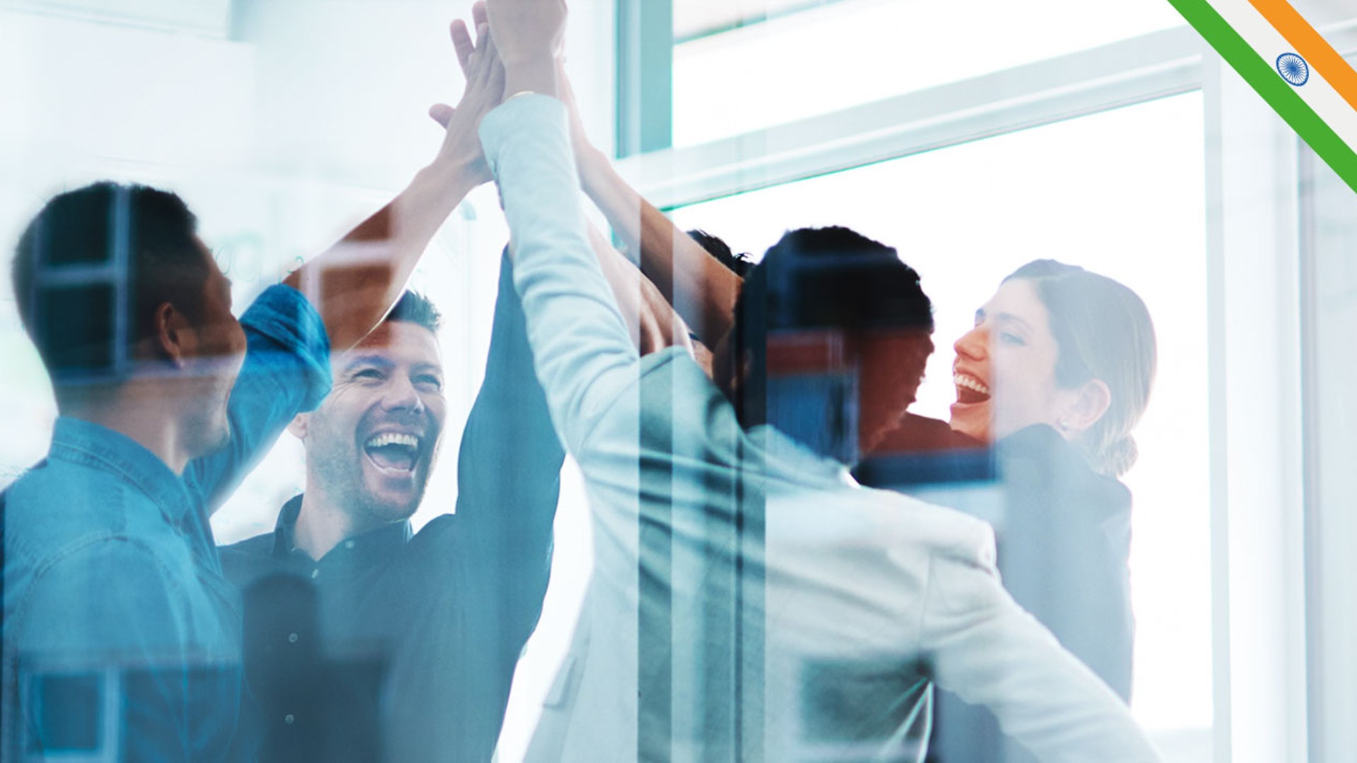 Team celebrating success with high-fives.