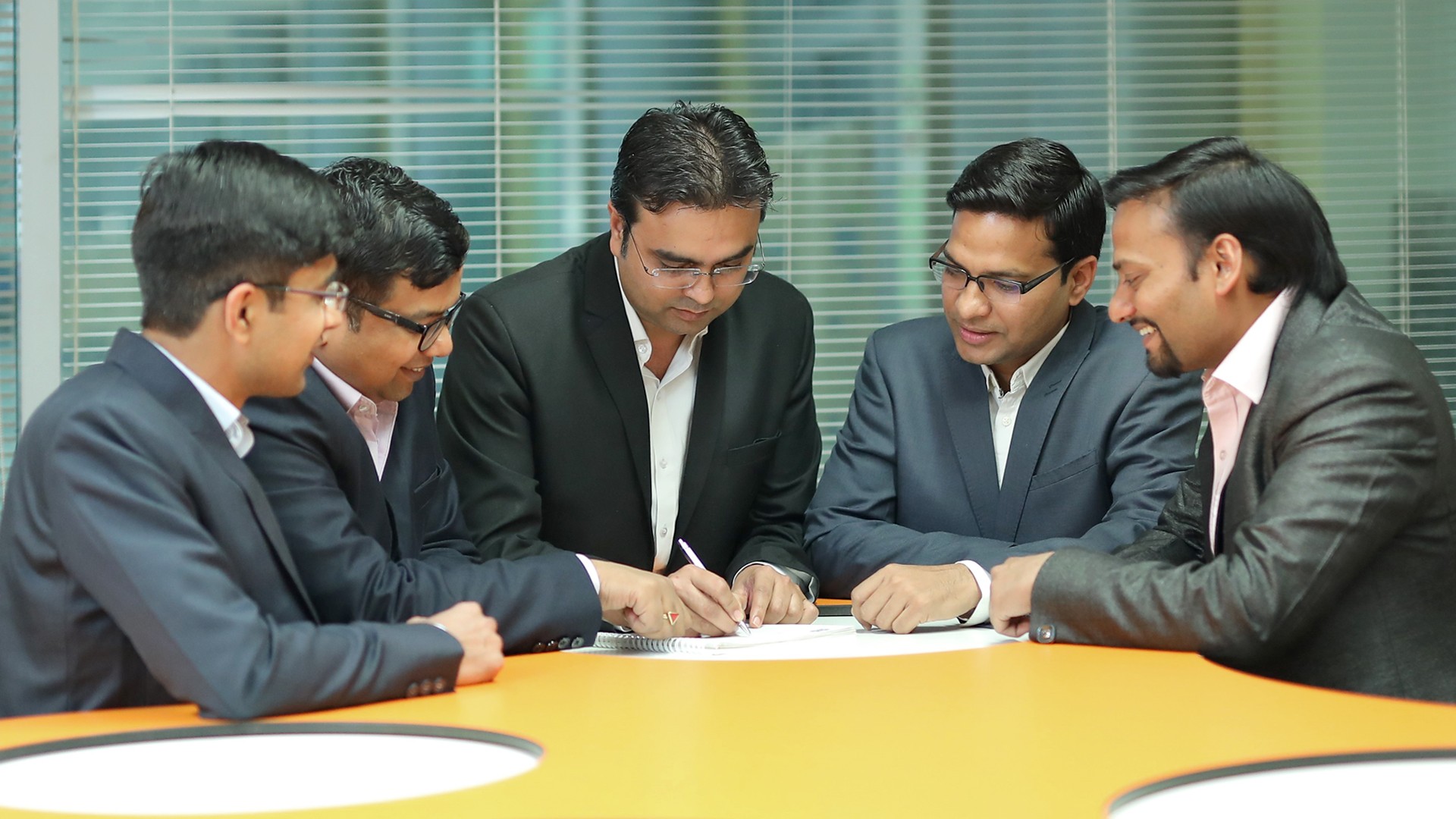 Business team discussing a project at conference