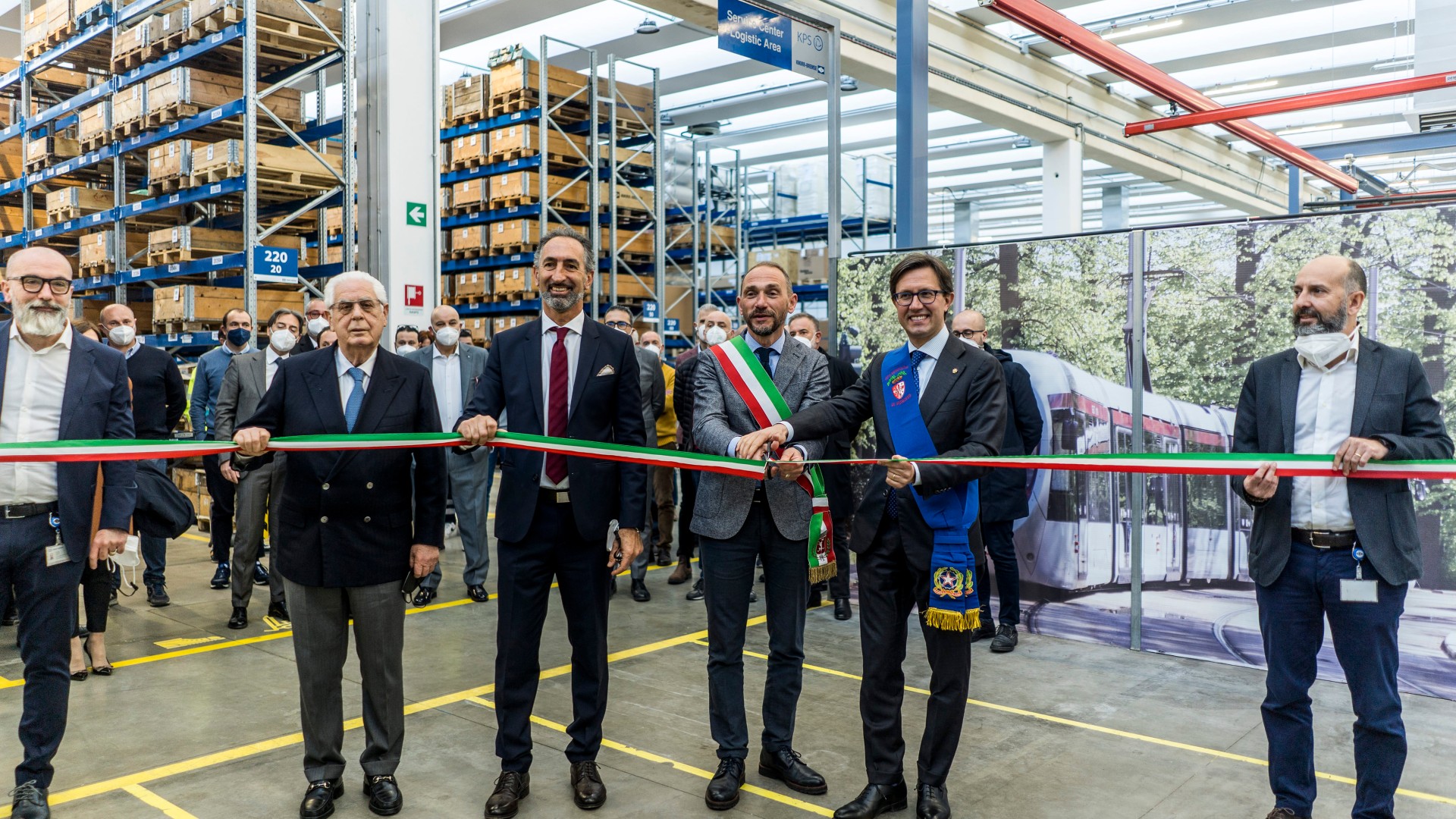 Ribbon-cutting ceremony at industrial warehouse facility