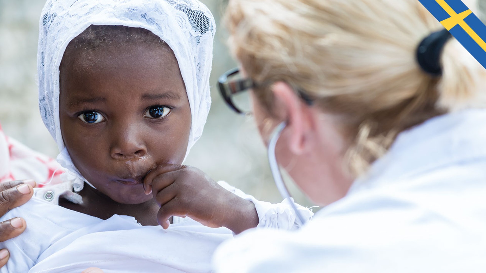 Mother and child during a medical consultation.