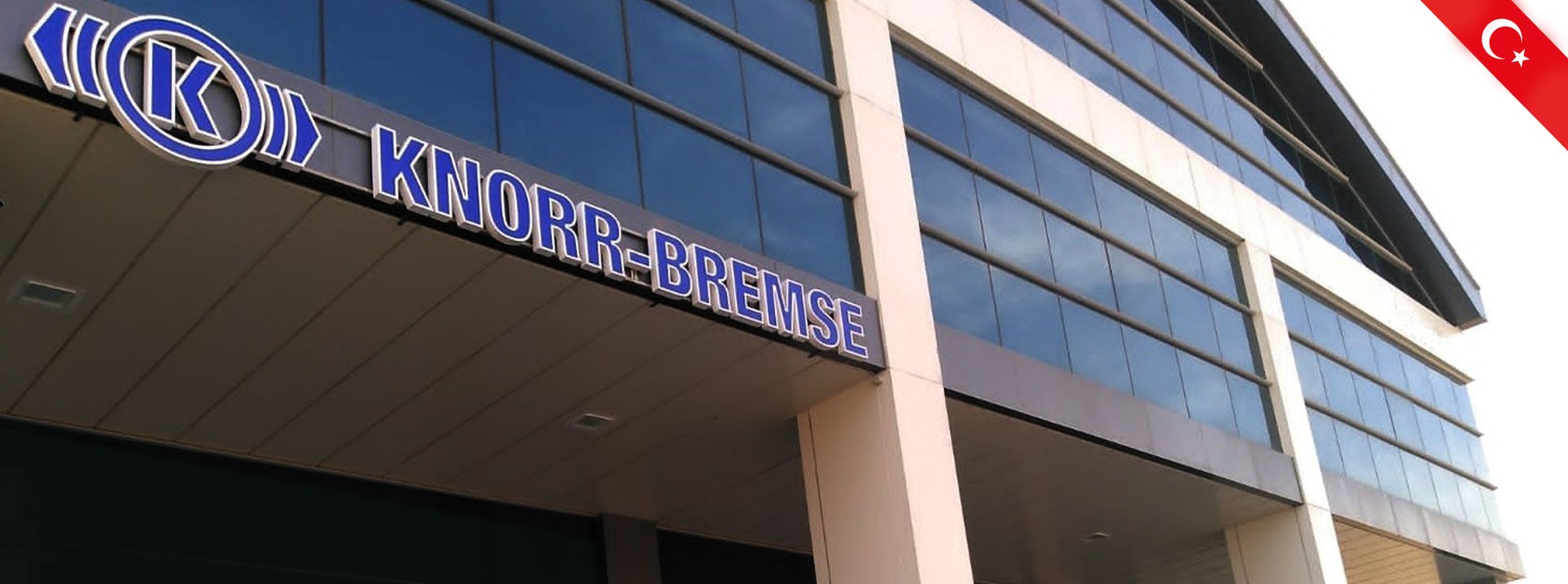 Knorr-Bremse company building exterior with logo.