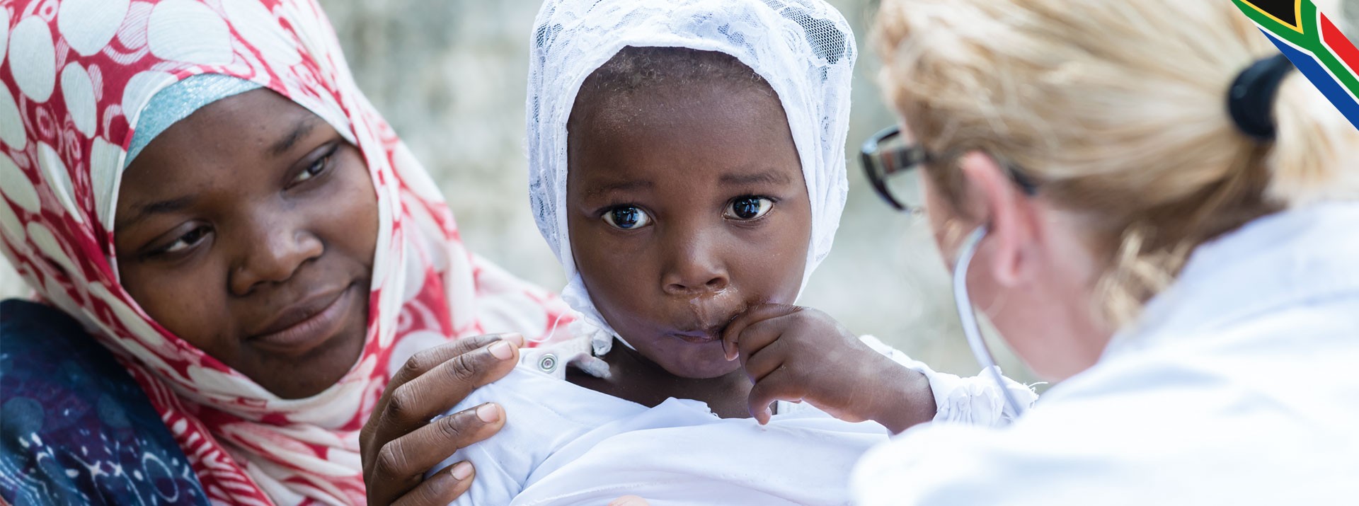 Mother and child at healthcare consultation moment.