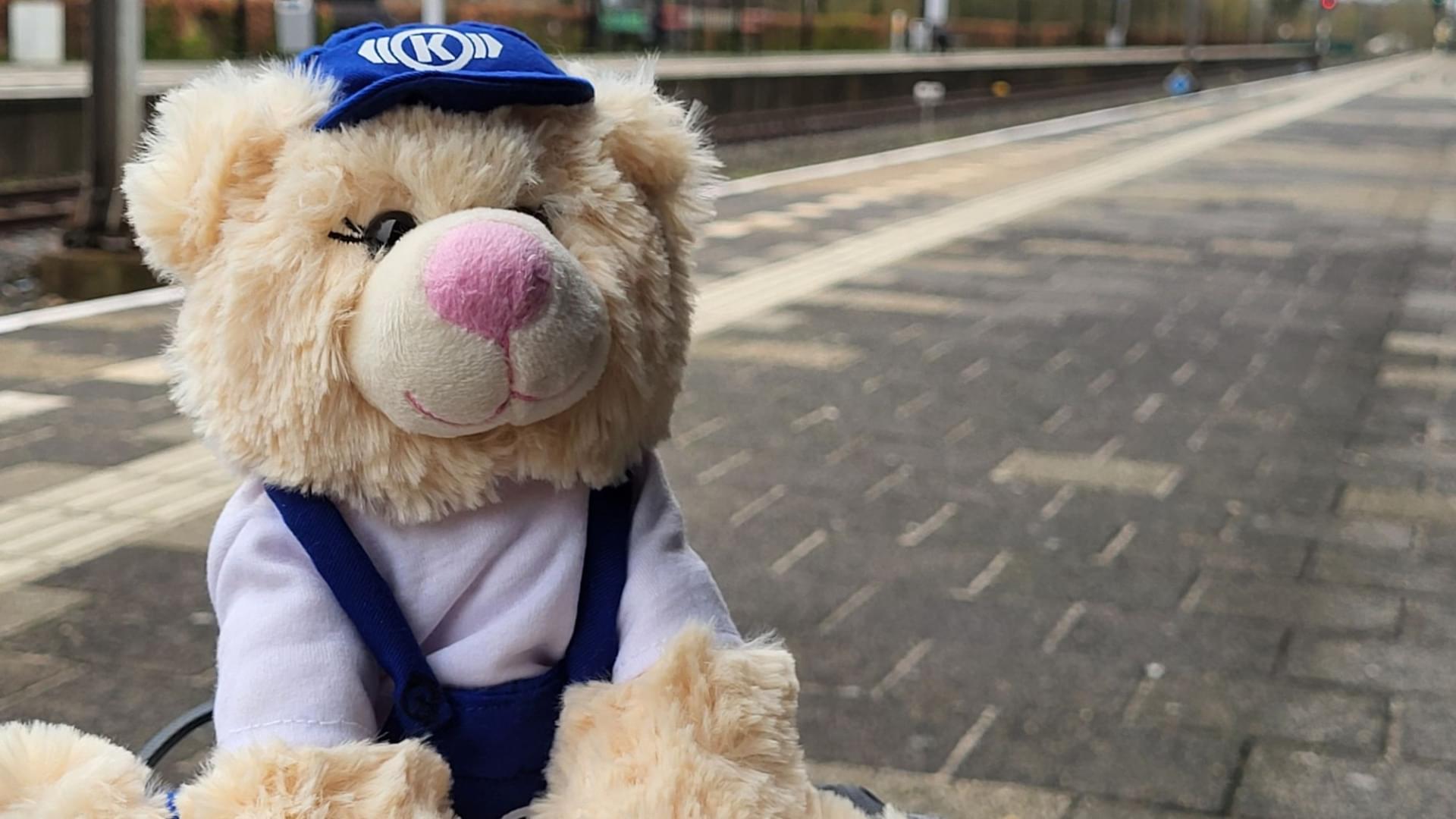 Mascot of Knorr-Bremse, a teddy bear called Knorr-Berta, at a train station
