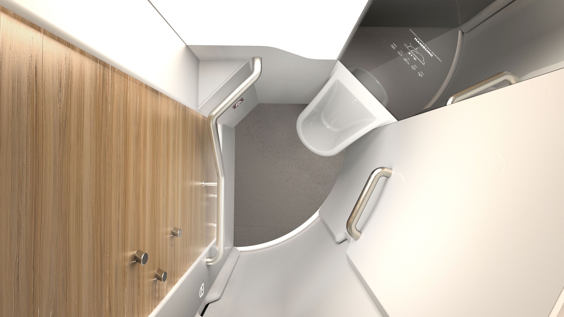 Modern train restroom design with sleek finishes.